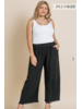 Wide leg pant with elastic waist, pockets and frayed hem