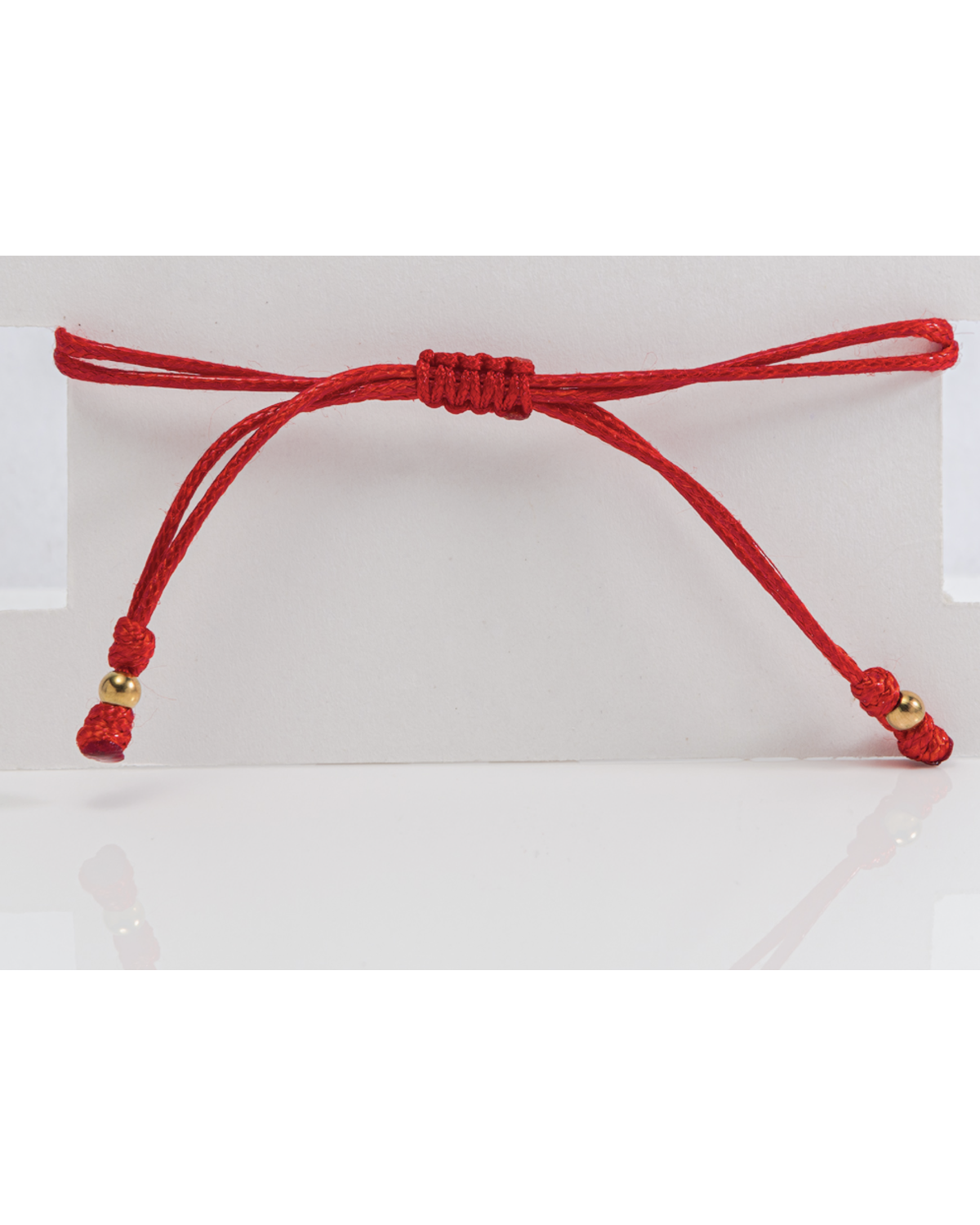 Pulseras rojas santos y perlas