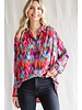 Print button up top with a collared neckline