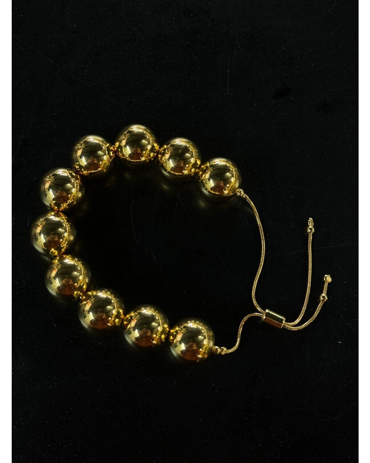 GOLD PLEATED SPHERES BRACELET