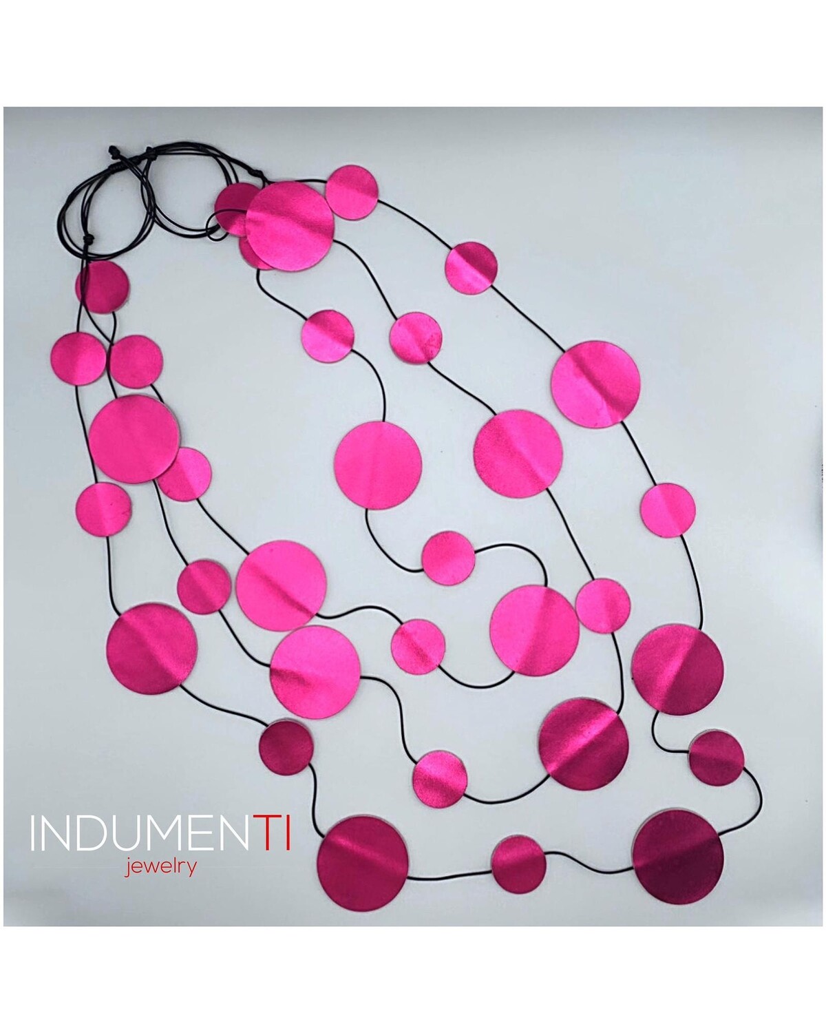 FUCSIA PUNTO IN PELLE
