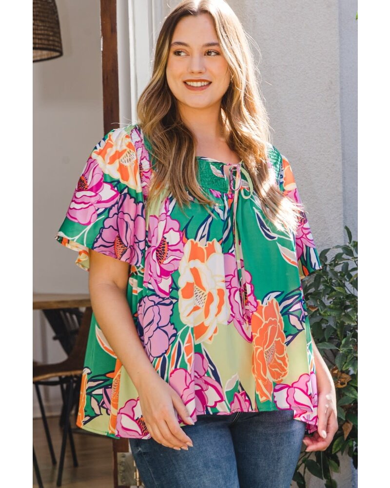 Floral printed blouse featuring v-neck