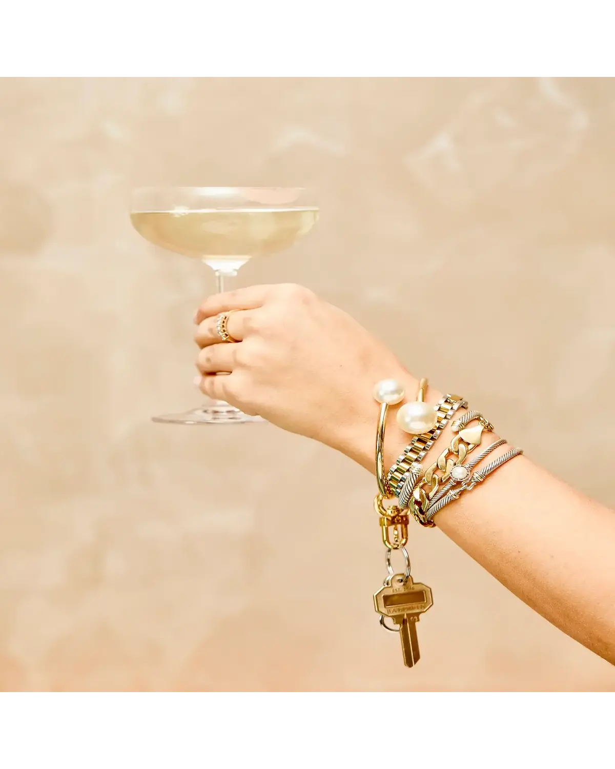 Big O® Phone Bracelet - Gold & Pearl Phone Wristlet