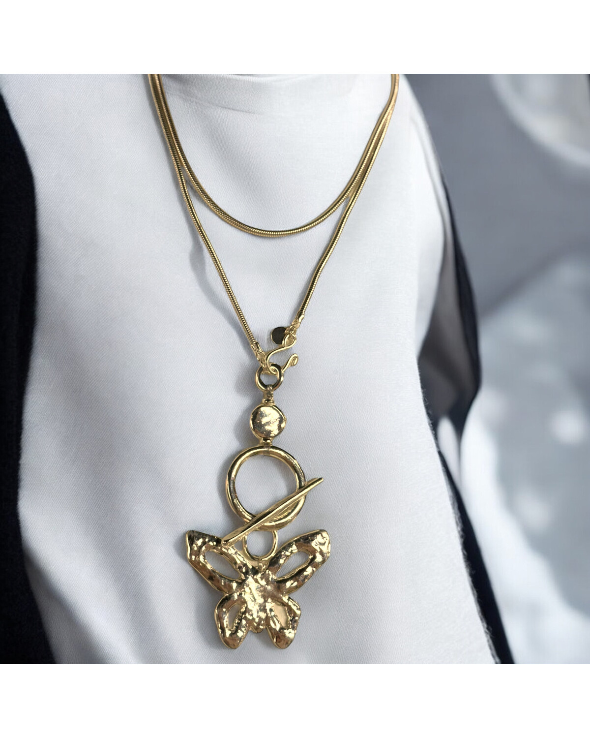 Golden butterfly necklace