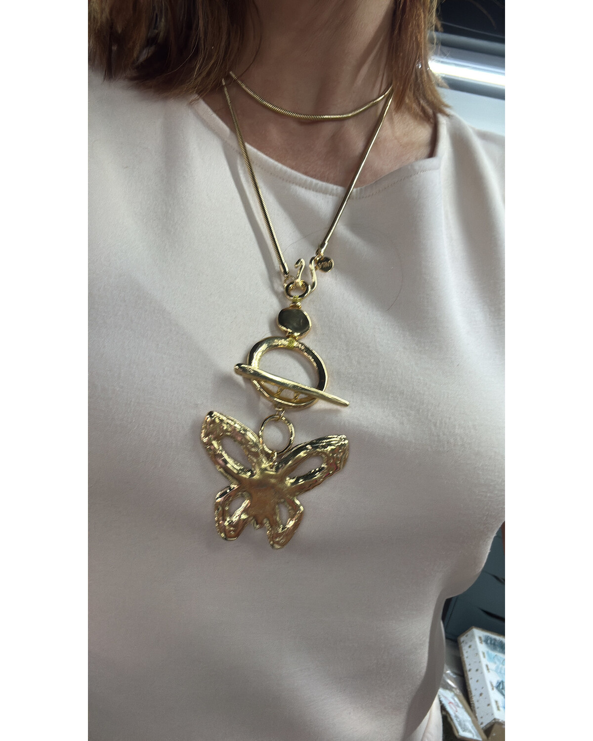 Golden butterfly necklace