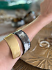 Spiral cuff horn bracket