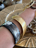Spiral cuff horn bracket