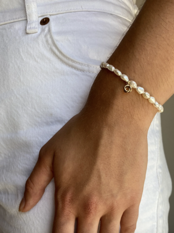 Flora Ciccarelli Flora Ciccarelli- 22A -002 Bracelet 6" en perle avec breloques / noeud