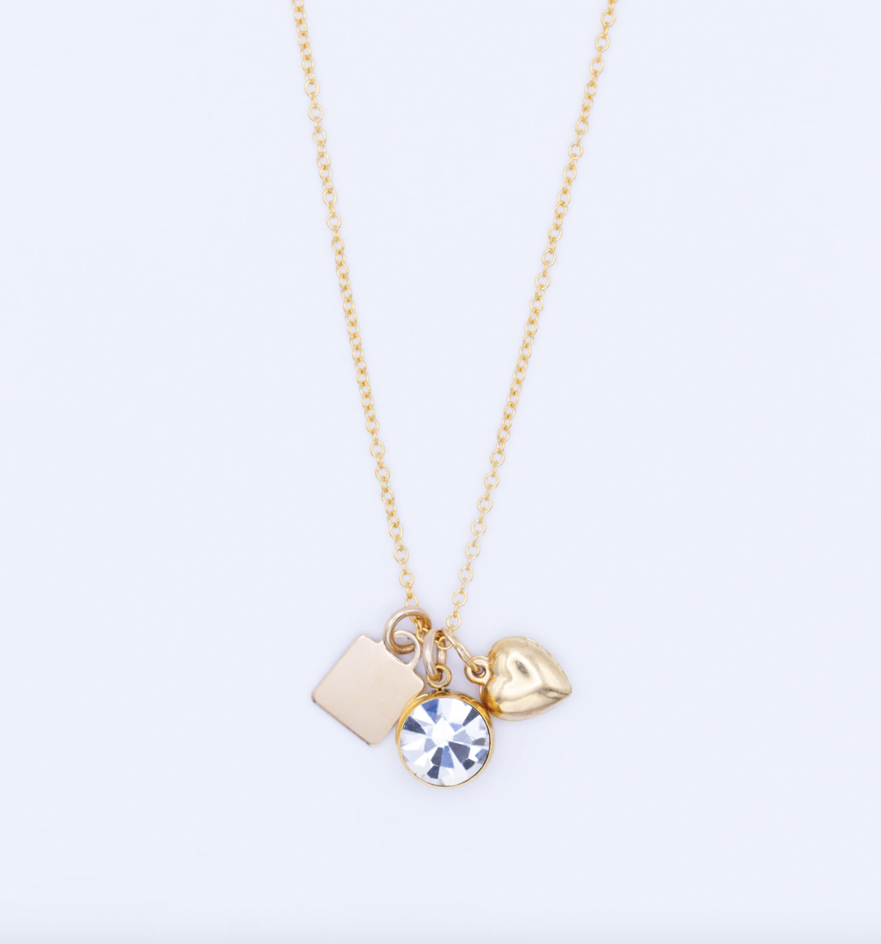 Flora Ciccarelli Flora Ciccarelli- 24P 210 Collier  three charms Ninnolo Gold 20"