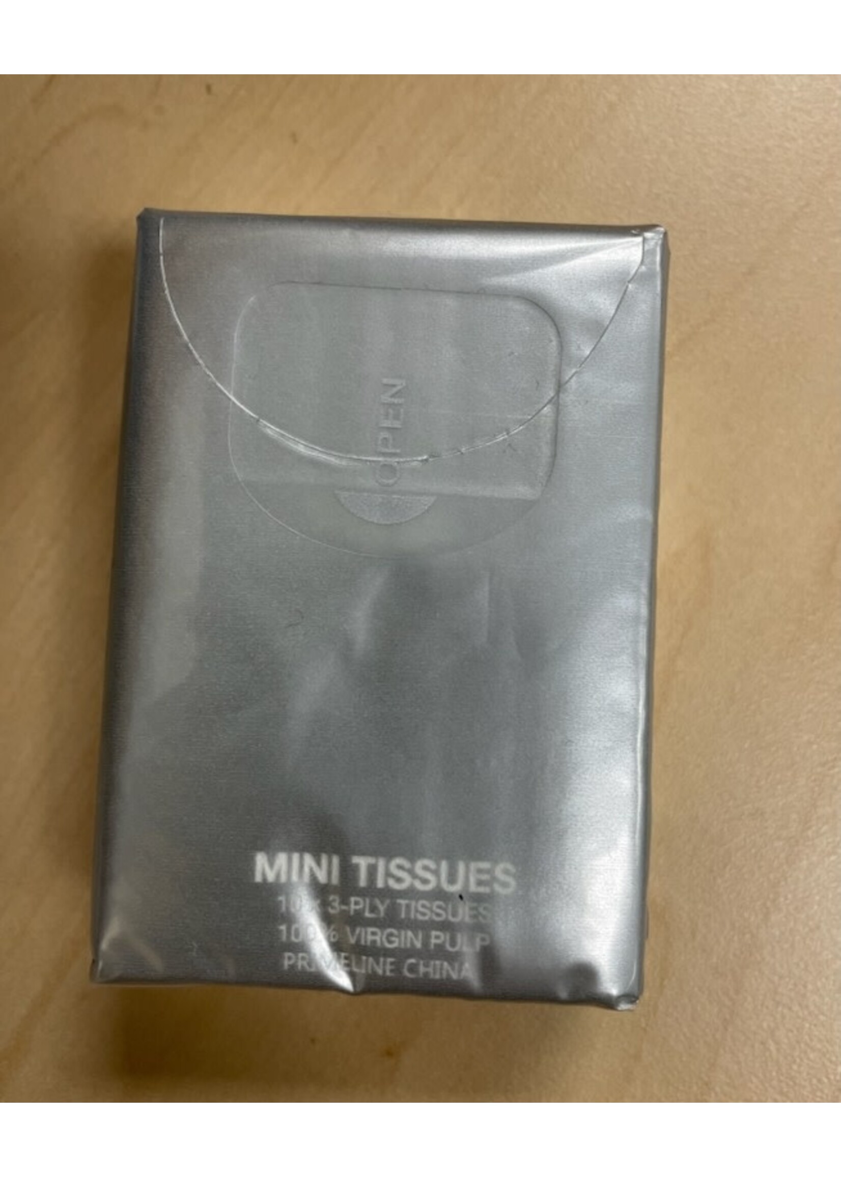 NON-UNIFORM Mini Tissue Packet