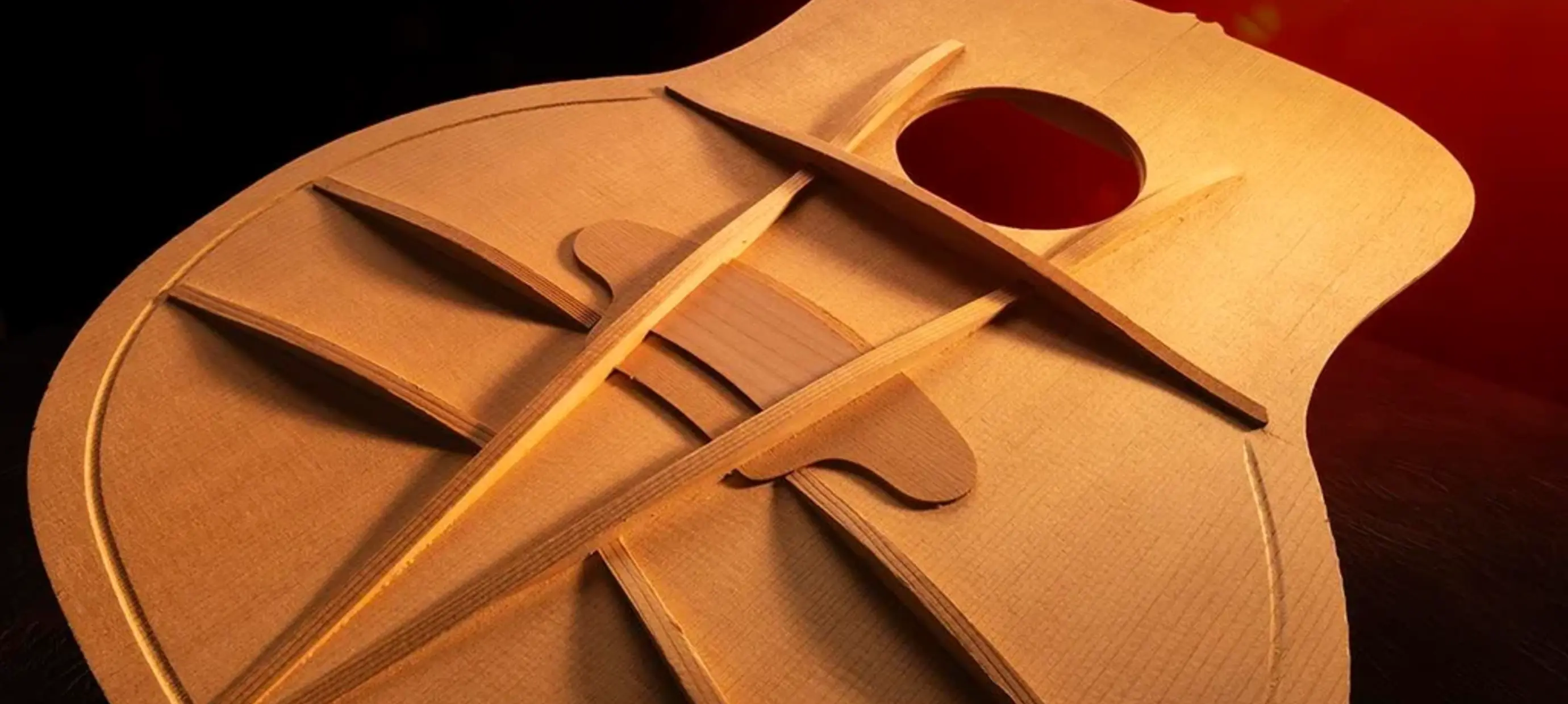 The Science of Acoustic Guitar Bracing Patterns: X-Bracing vs Scalloped vs Forward-Shifted
