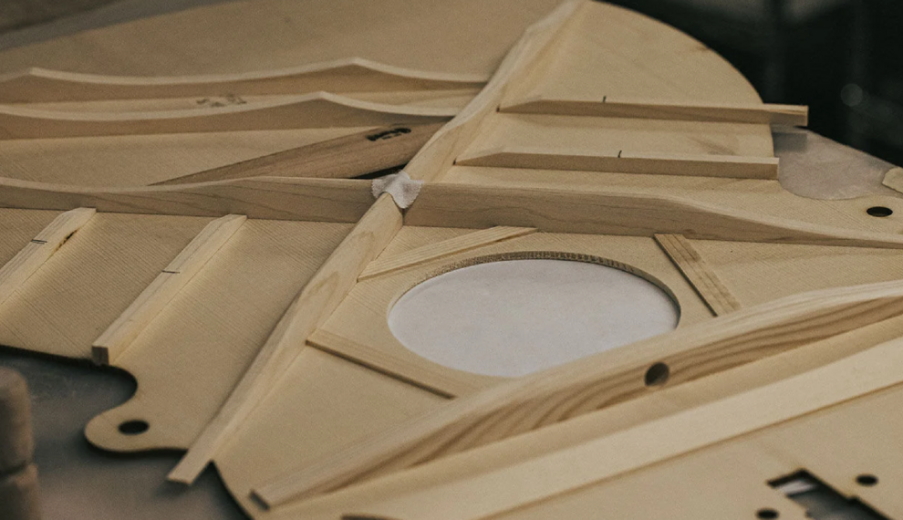 The Science of Acoustic Guitar Bracing Patterns: X-Bracing vs Scalloped vs Forward-Shifted