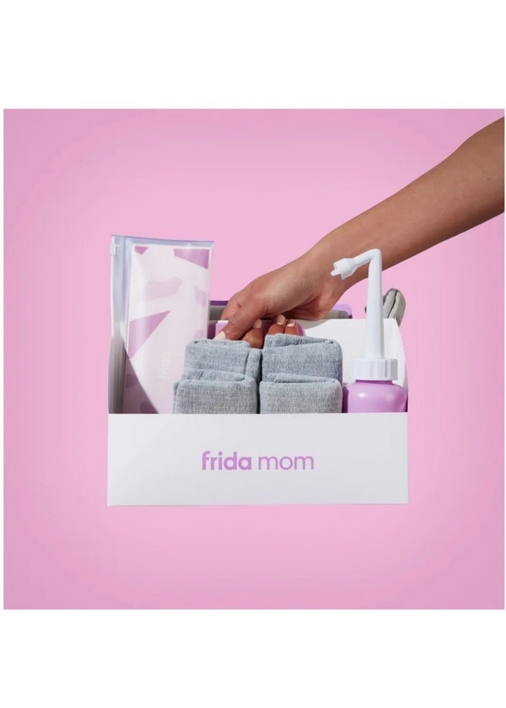 Opening and comparing the Frida Mom Postpartum recovery essential kit