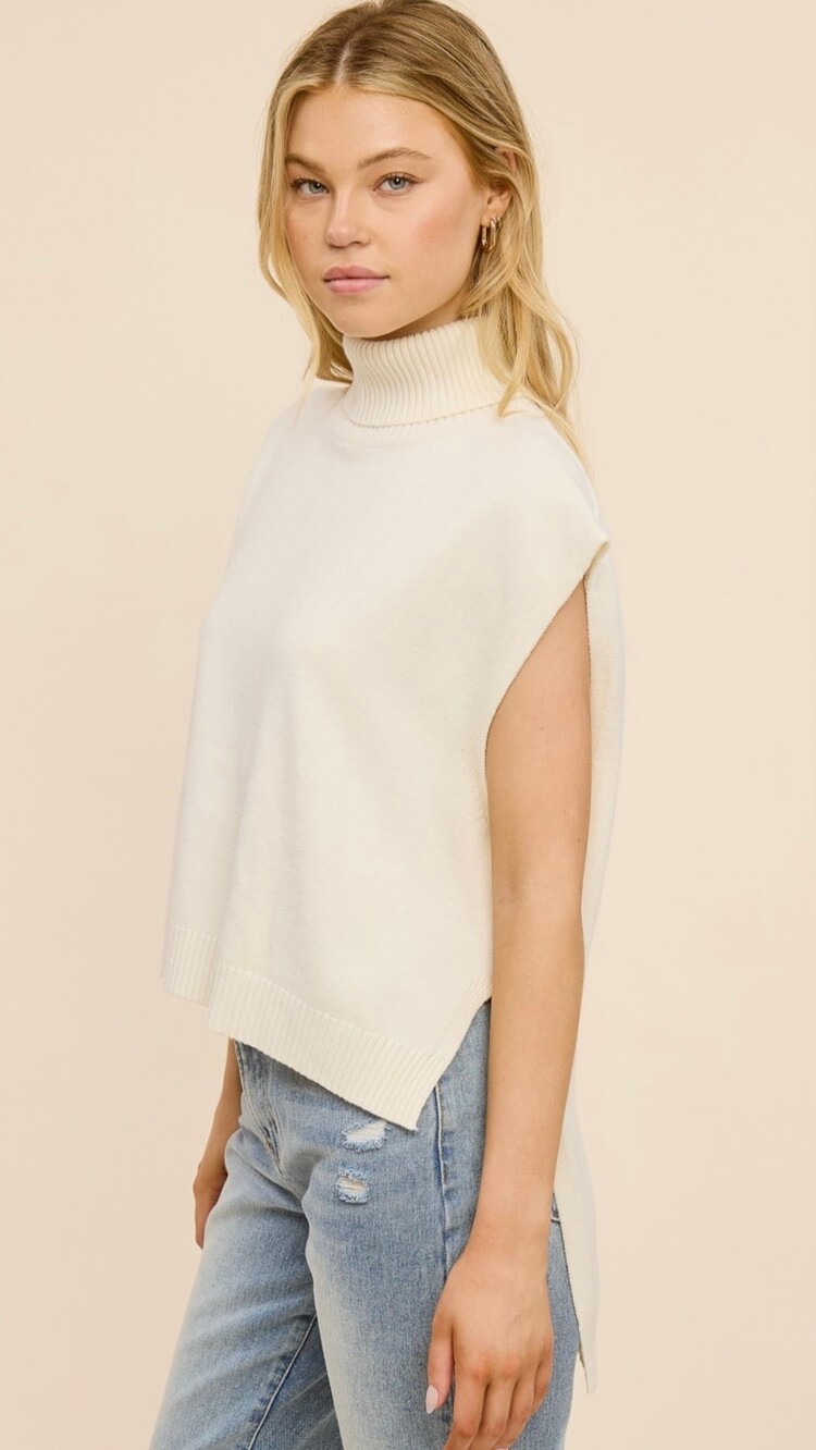Hi-Low Sleeveless Turtleneck Sweater