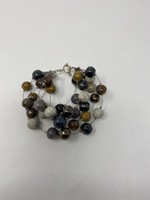 MULTI STRING ROUND BEADED BRACELET