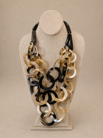 MULTI LAYERED ROUND HORN STATEMENT NECKLACE