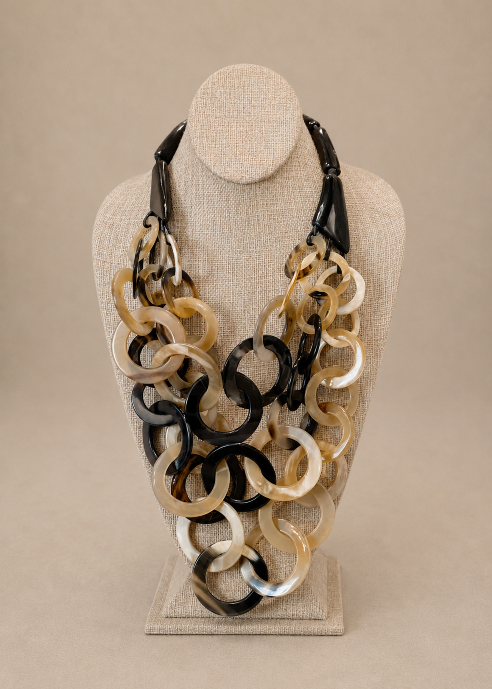 MULTI LAYERED ROUND HORN STATEMENT NECKLACE
