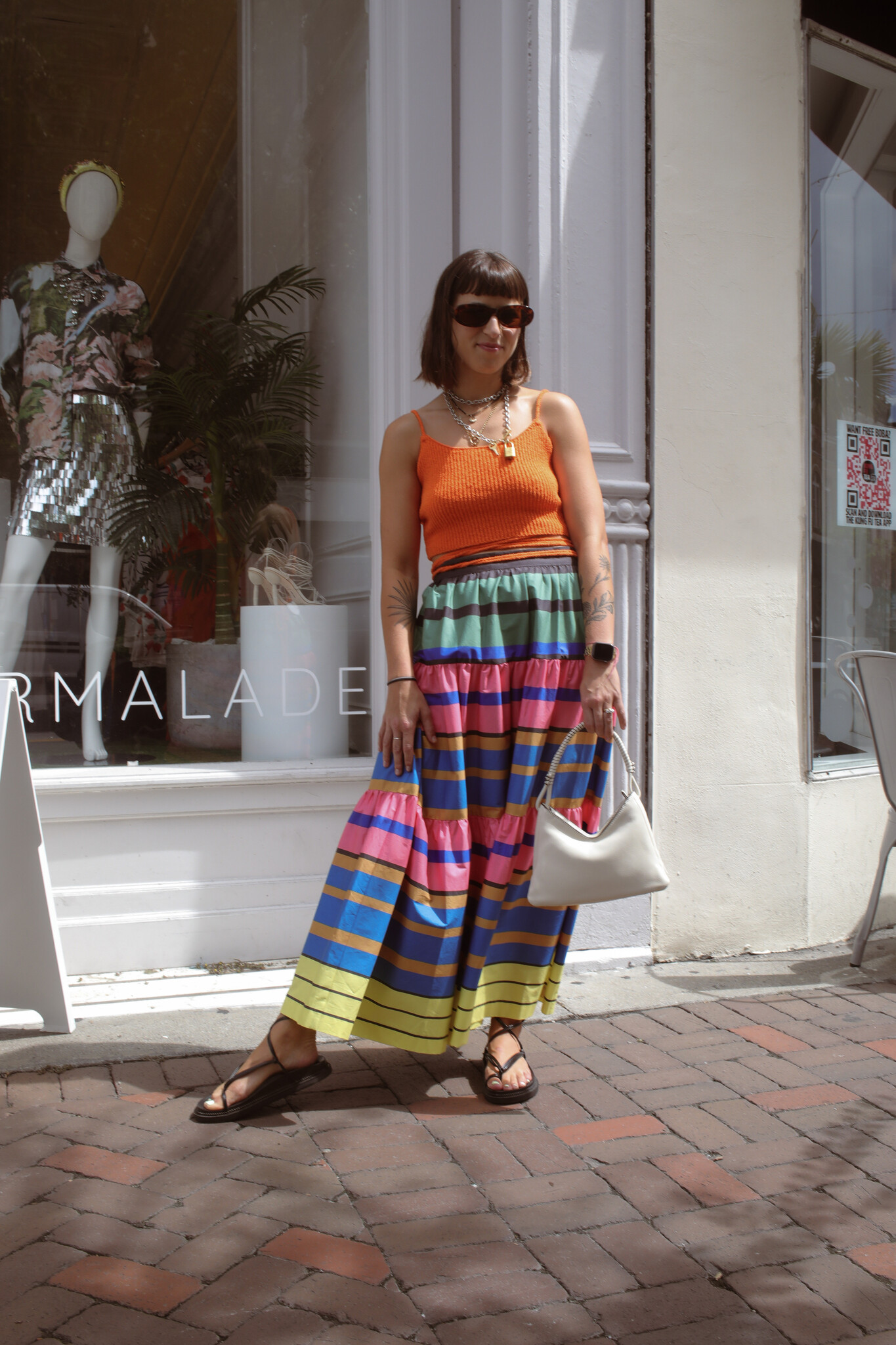 Color and organic materials to stay cool, top from Holzweiler paired with Staud striped skirt