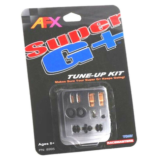 AFX Afx Super + Chassis Tune-up Kit  INCLUDES :4Pick Up Shoes, 1X Axle, 2Springs 2 Rear tyres 1 X Fits Tomy will also work on most standard afx cars