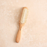 Hairbrush with wooden pins