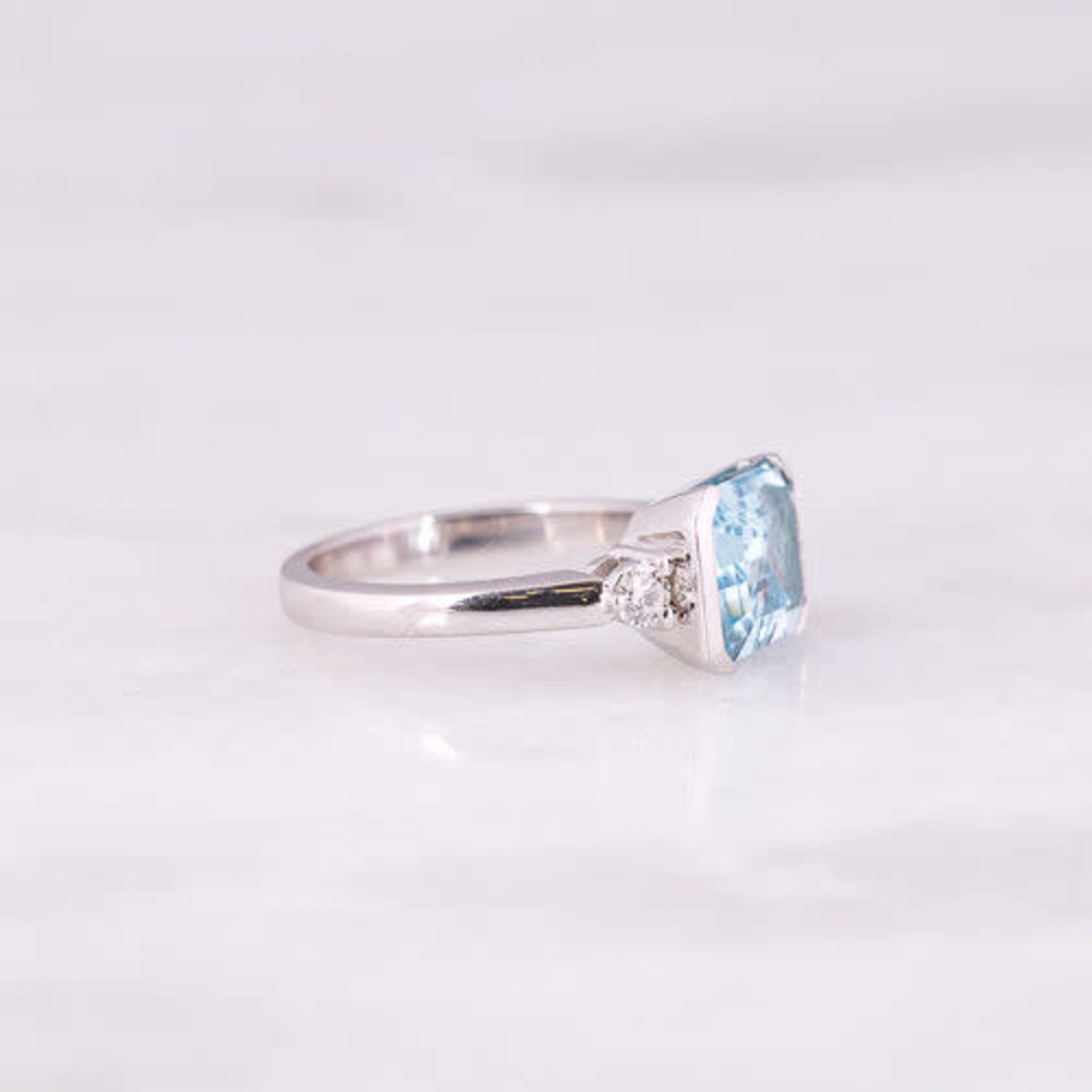 14K White Gold Blue Topaz & Diamond 0.20ctw Semi Bezel Ring