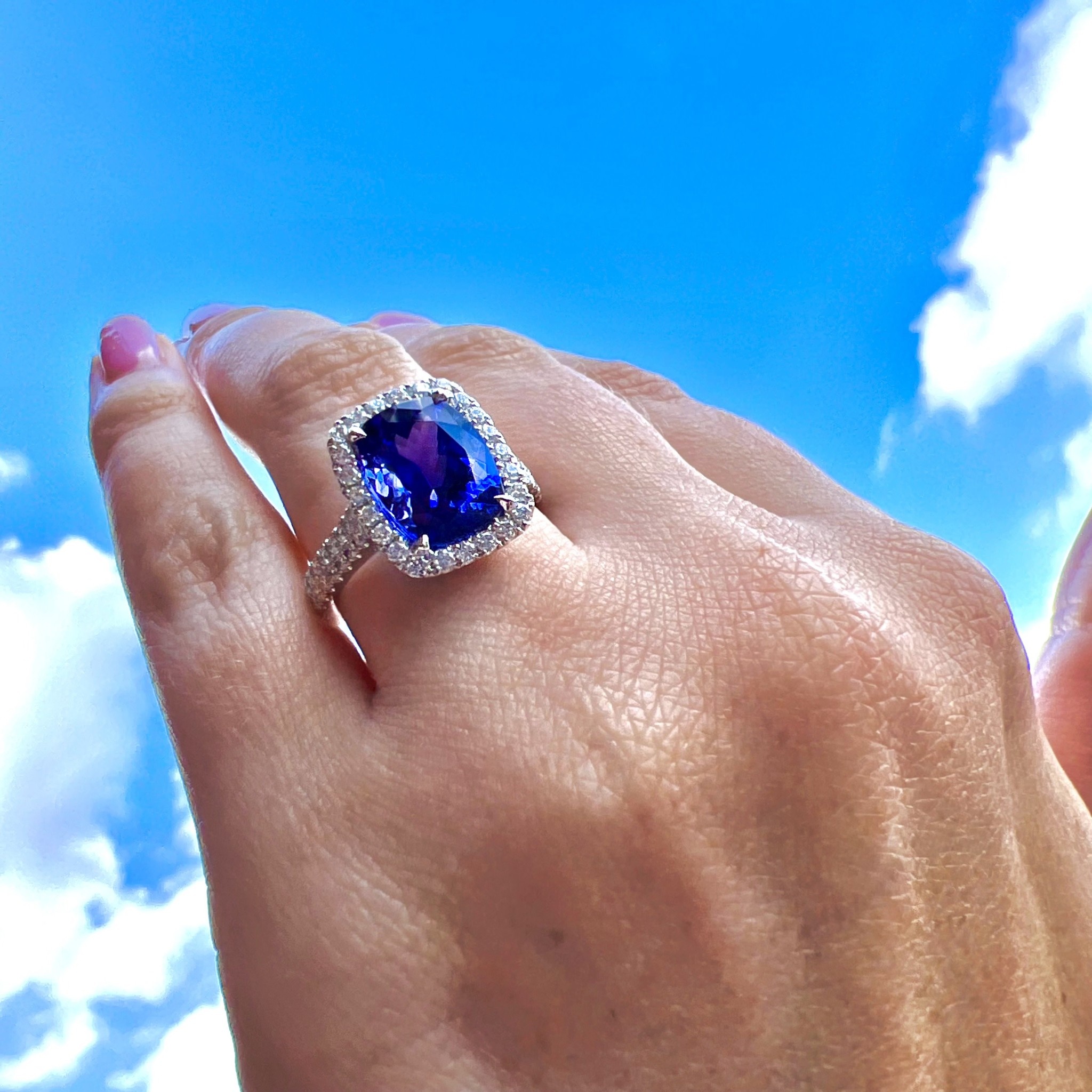 18KW Gold Tanzanite Diamond Halo Ring