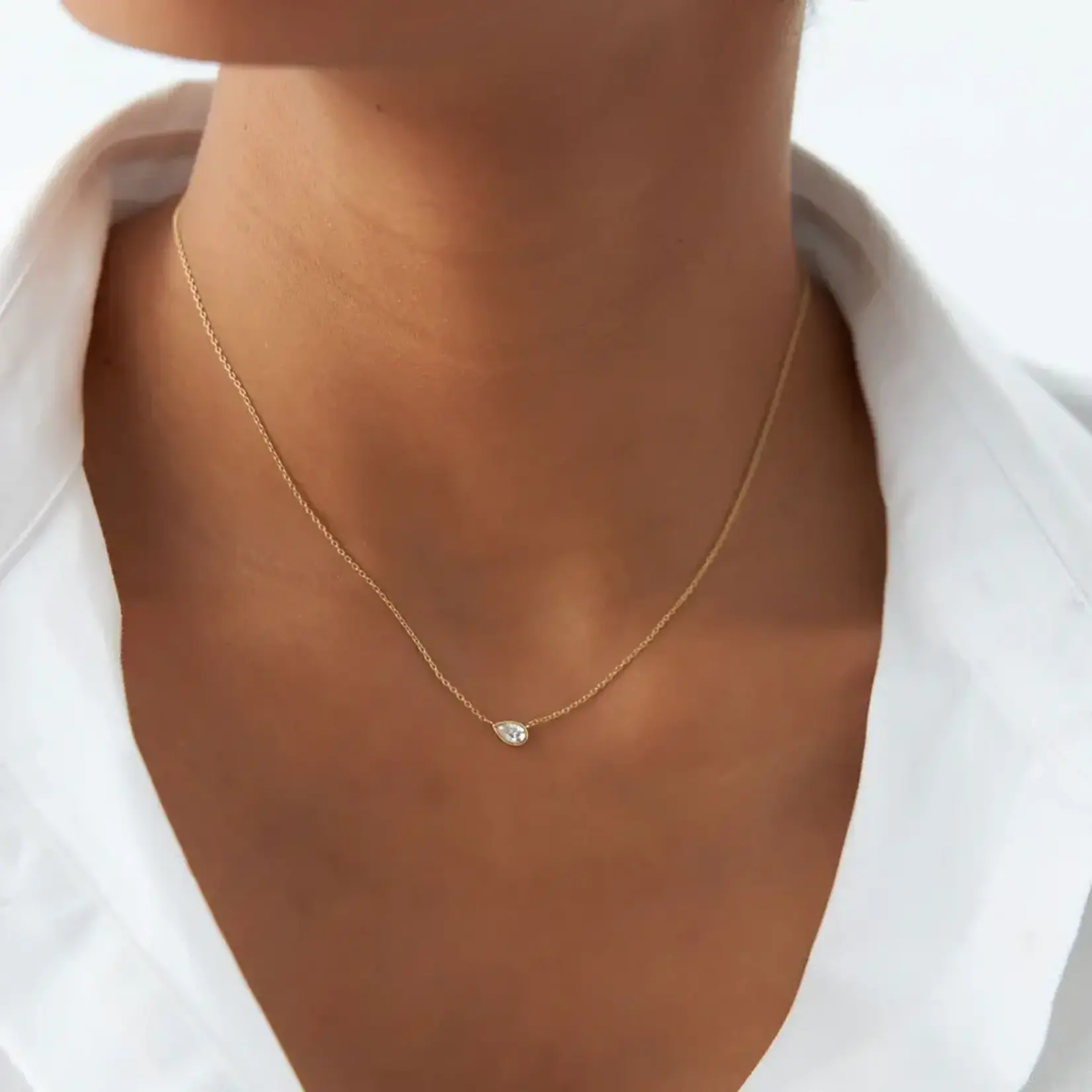 14K Yellow Gold Pear Shape Sideways Diamond Bezel Pendant