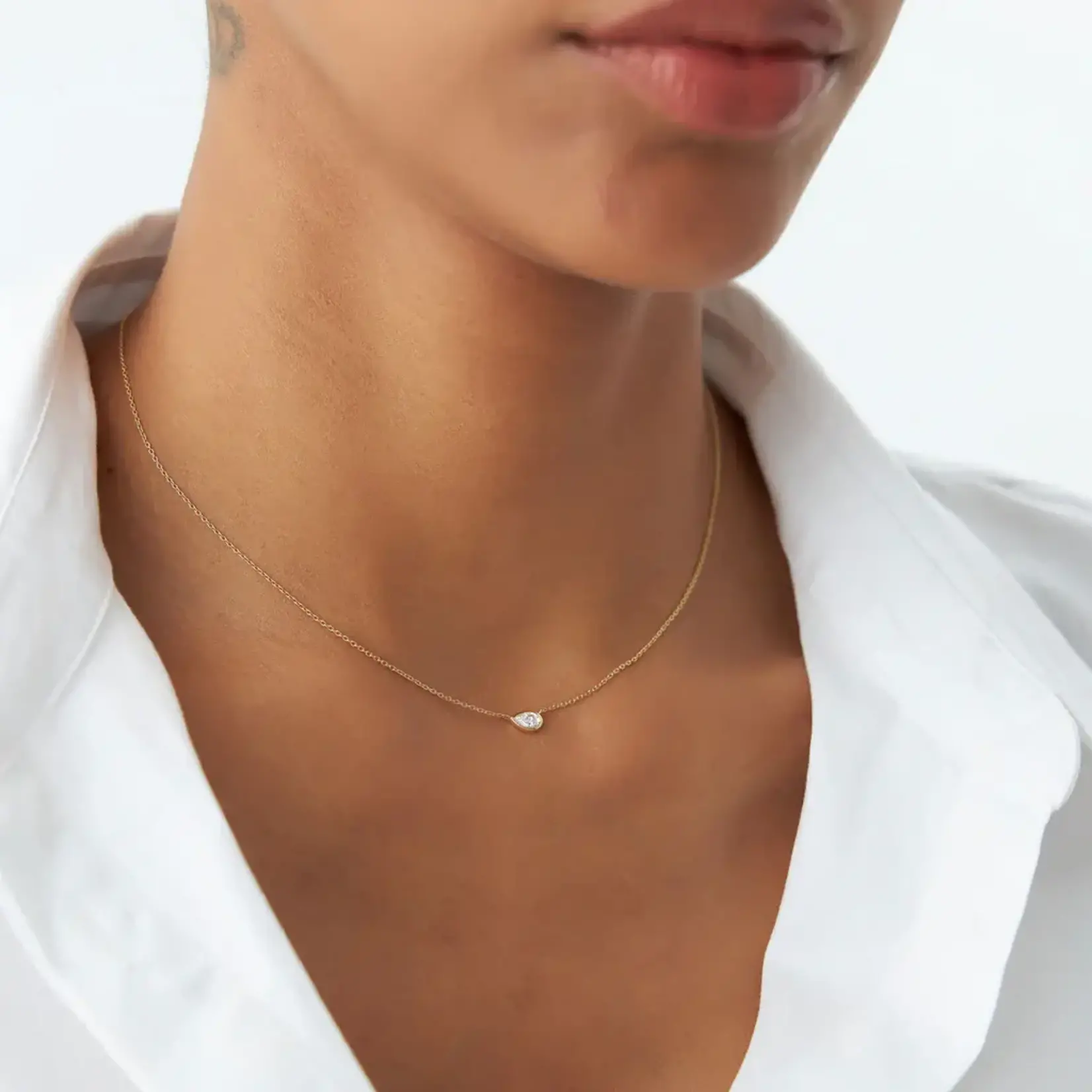 14K Yellow Gold Pear Shape Sideways Diamond Bezel Pendant