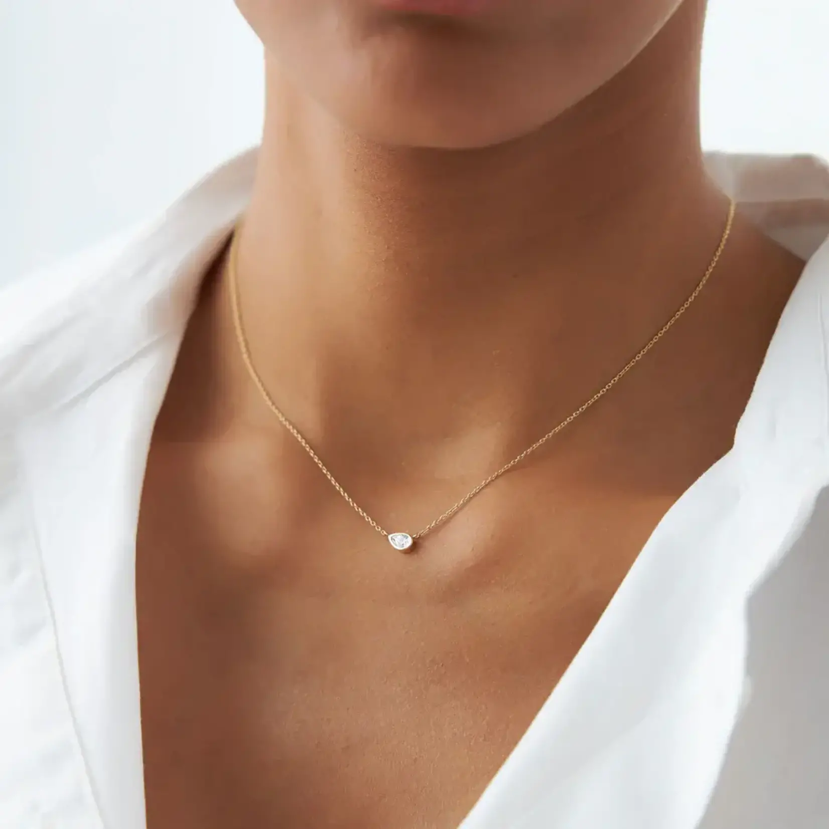 14K Yellow Gold Pear Shape Sideways Diamond Bezel Pendant