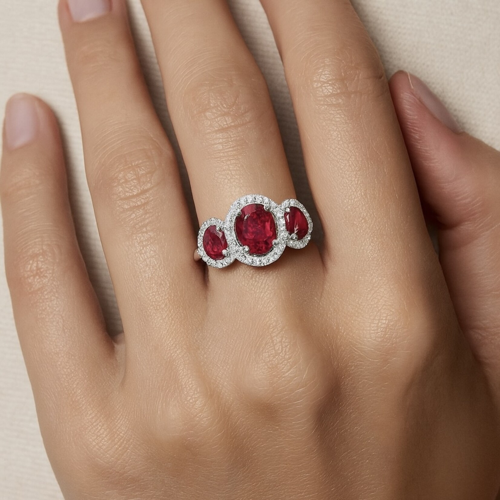 14KW Ruby 1.25ctw & Diamond 0.25ctw Three Stone Halo Ring
