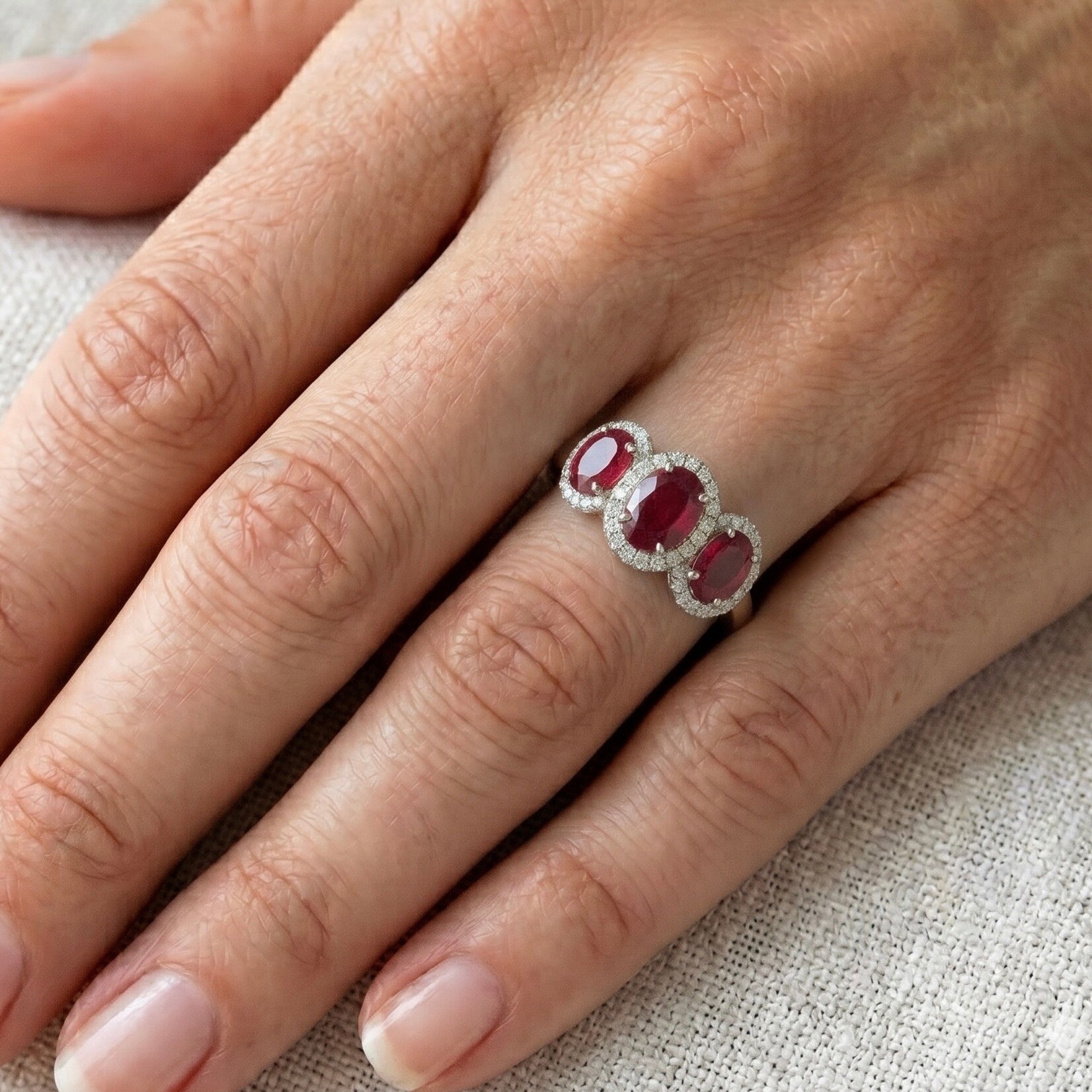 14K White Gold Three Stone Ruby and Diamond Halo Ring