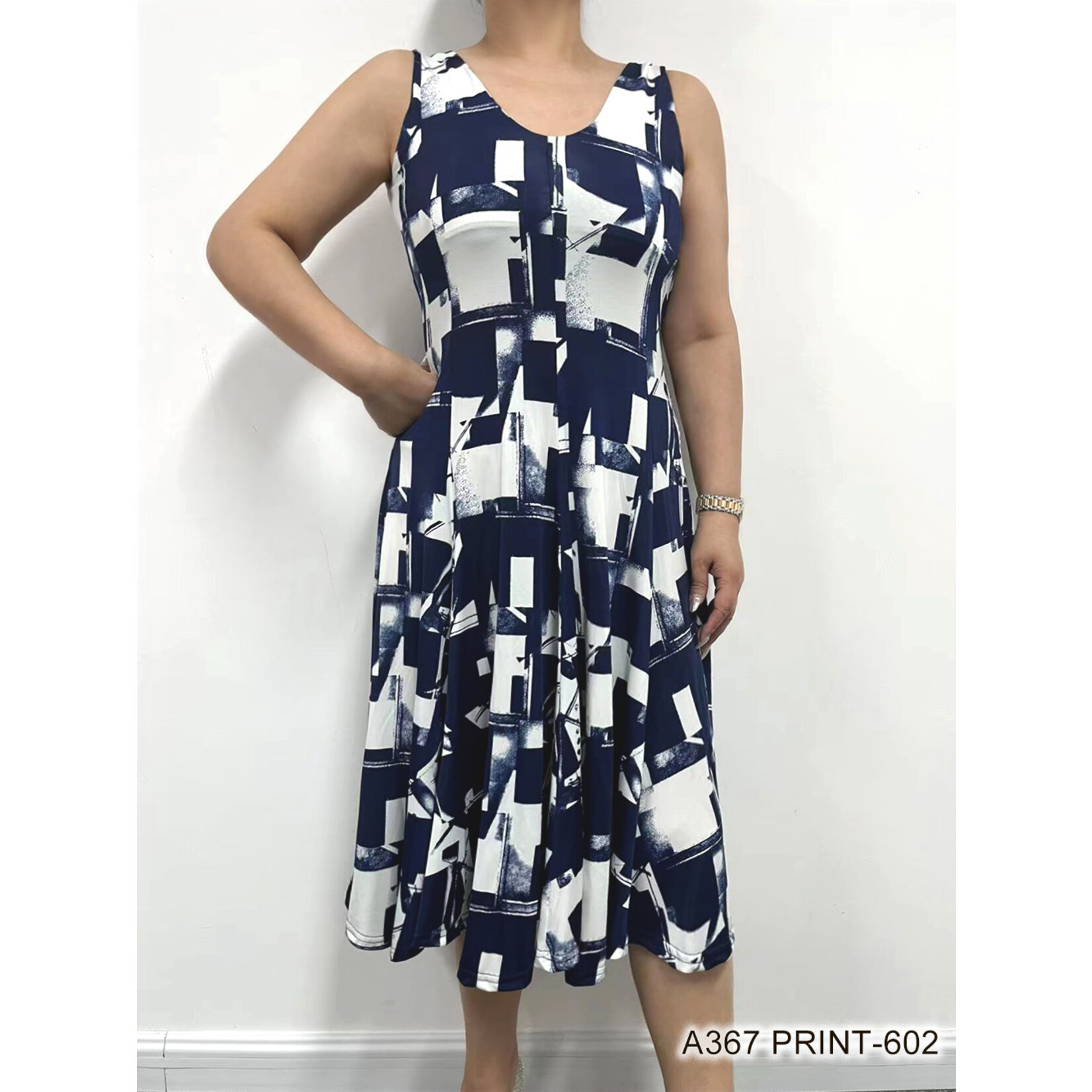 Creations printed sleeveless dress with pleats, multiple prints available
