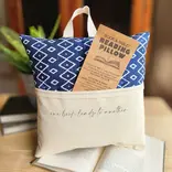 Desmond Brown READING/TABLET PILLOW - ONE BOOK LEADS TO ANOTHER
