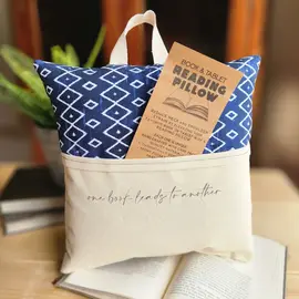 Desmond Brown READING/TABLET PILLOW - ONE BOOK LEADS TO ANOTHER