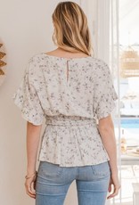Oddi Floral Woven Print Blouse Boat Neck Ruffle Detail on Short Sleeves and 3 Lines of Elastic Detail on Waist