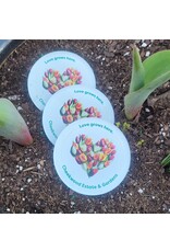 Love Grows Here Magnet