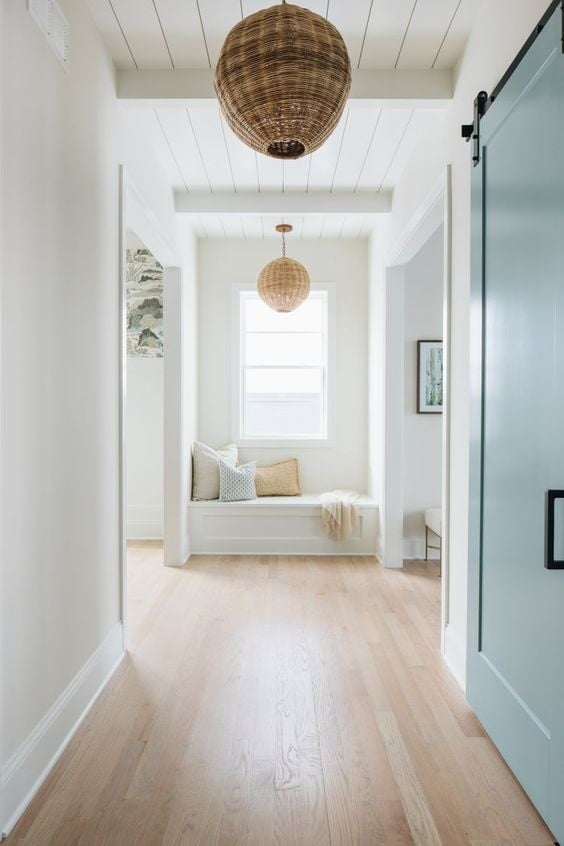 Coastal hallway with large barn door to the right