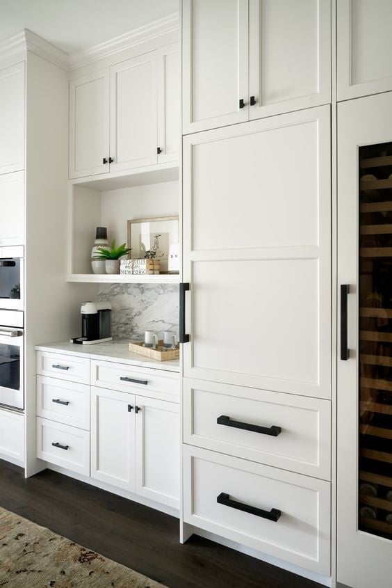 White kitchen with black square modern handles