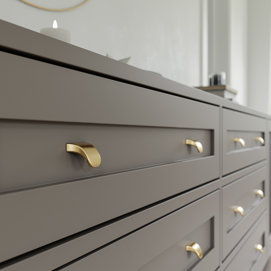 Grey shaker style drawers with gold finger pull handles