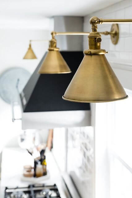 Close up shot of Brass Lighting above stove