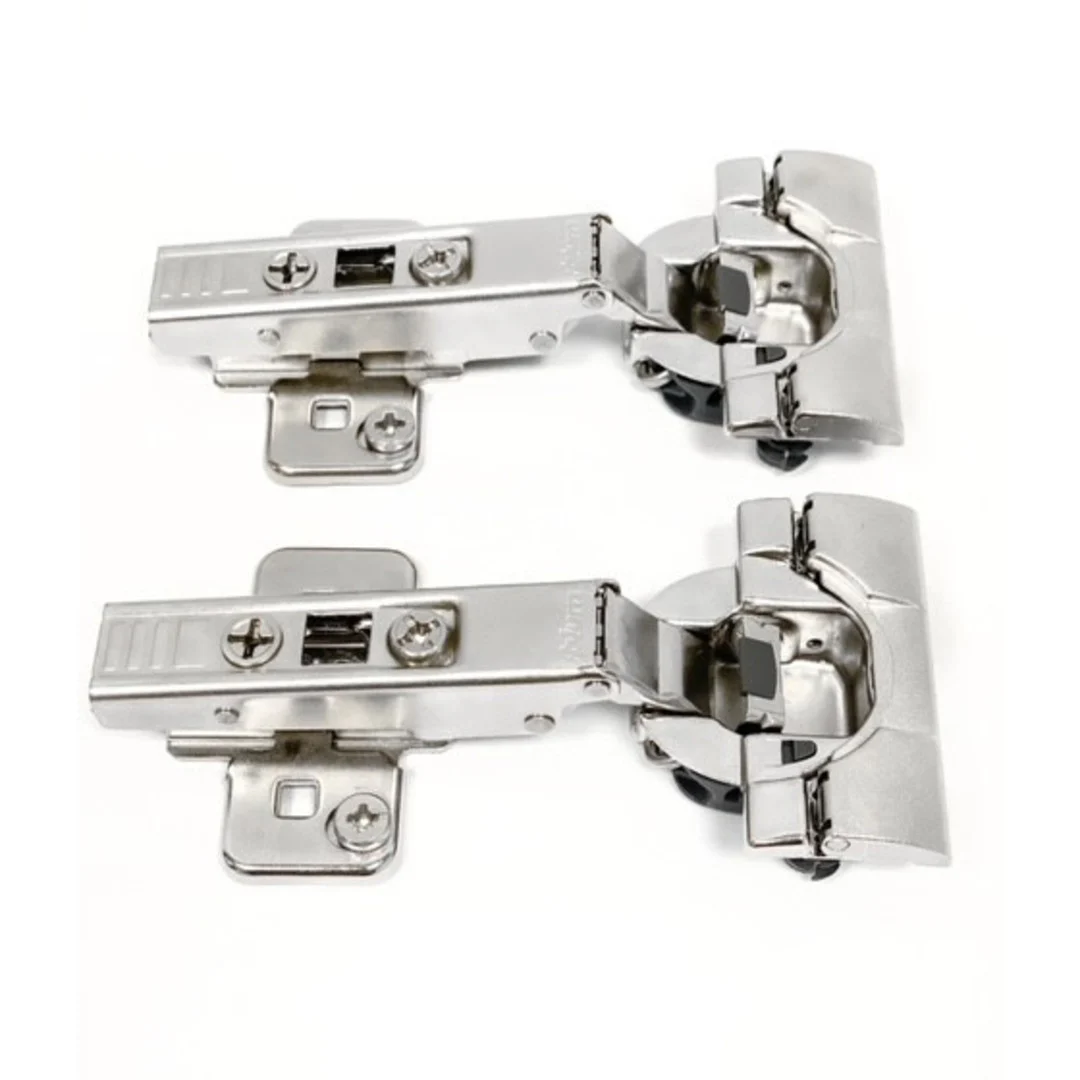 Two soft close hinges with their hinge plates