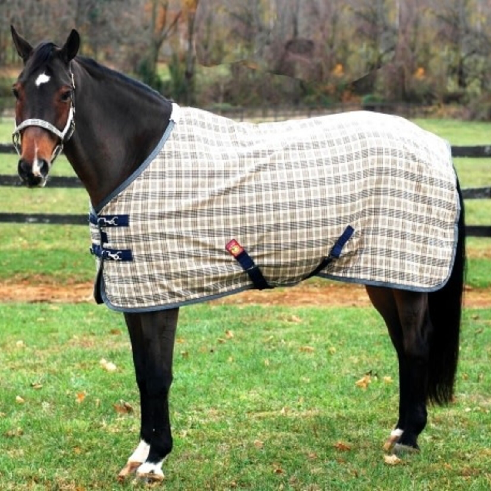 Baker 7003 Baker Sheet Deluxe Trim w/ added Real Aust Merino Sheepskin at wither, satin lined shoulders, snap-buckle front, elastic surcingle inserts and elastic leg straps AVAILABLE 66”-86