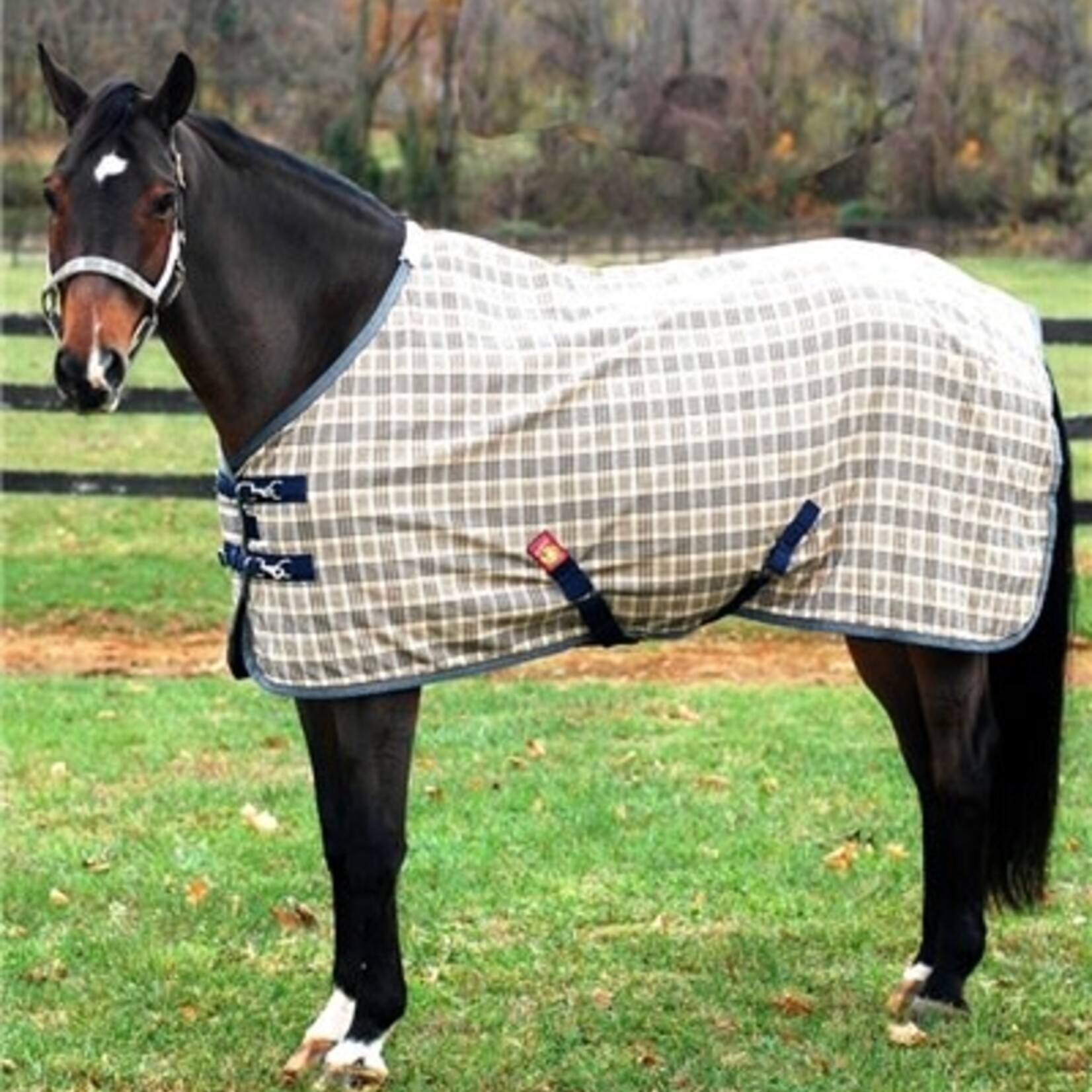 Baker 7070 Baker Blanket Deluxe Trim w/ added Real Aust Merino Sheepskin at wither, satin lined shoulders, snap-buckle front, elastic surcingle inserts and elastic leg straps AVAILABLE 66”-86"