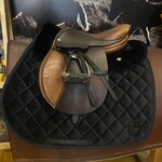 Beval Consigned Bevals Junior Saddle 14”, measurement from dot to dot is 4.5”, measures 11" flap length, measures 11.5" flap width, 4" safety stirrups and leathers included