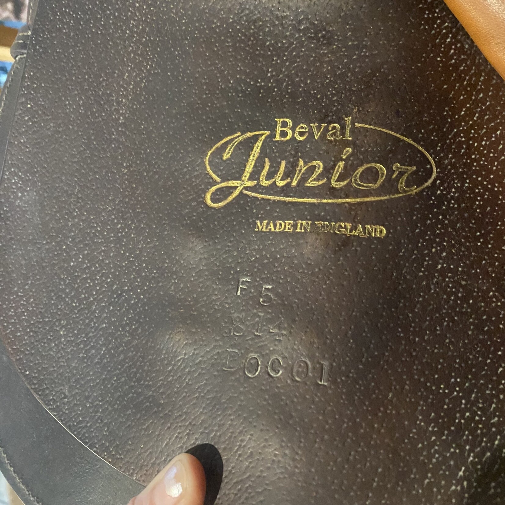 Beval Consigned Bevals Junior Saddle 14”, measurement from dot to dot is 4.5”, measures 11" flap length, measures 11.5" flap width, 4" safety stirrups and leathers included