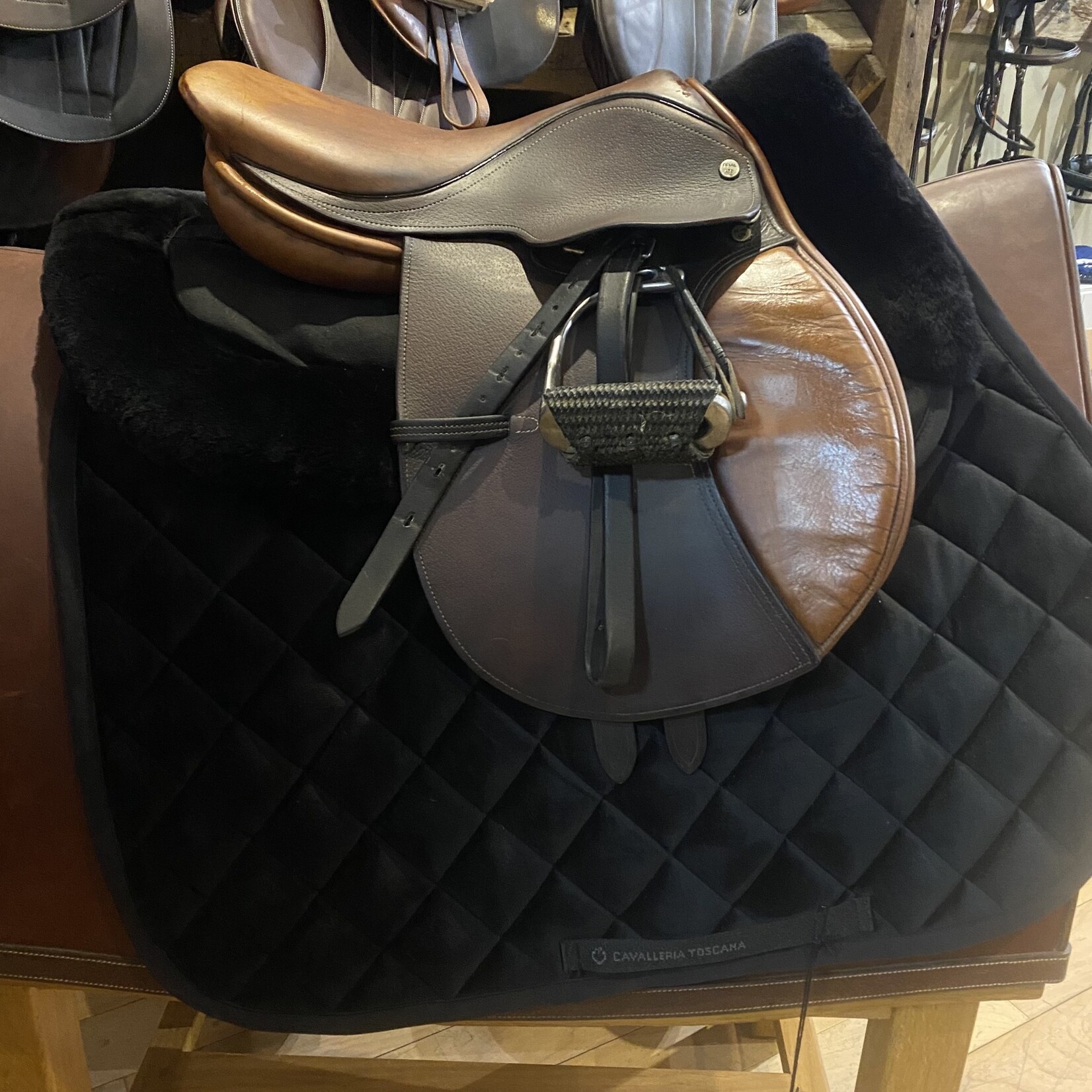 Beval Consigned Bevals Junior Saddle 14”, measurement from dot to dot is 4.5”, measures 11" flap length, measures 11.5" flap width, 4" safety stirrups and leathers included