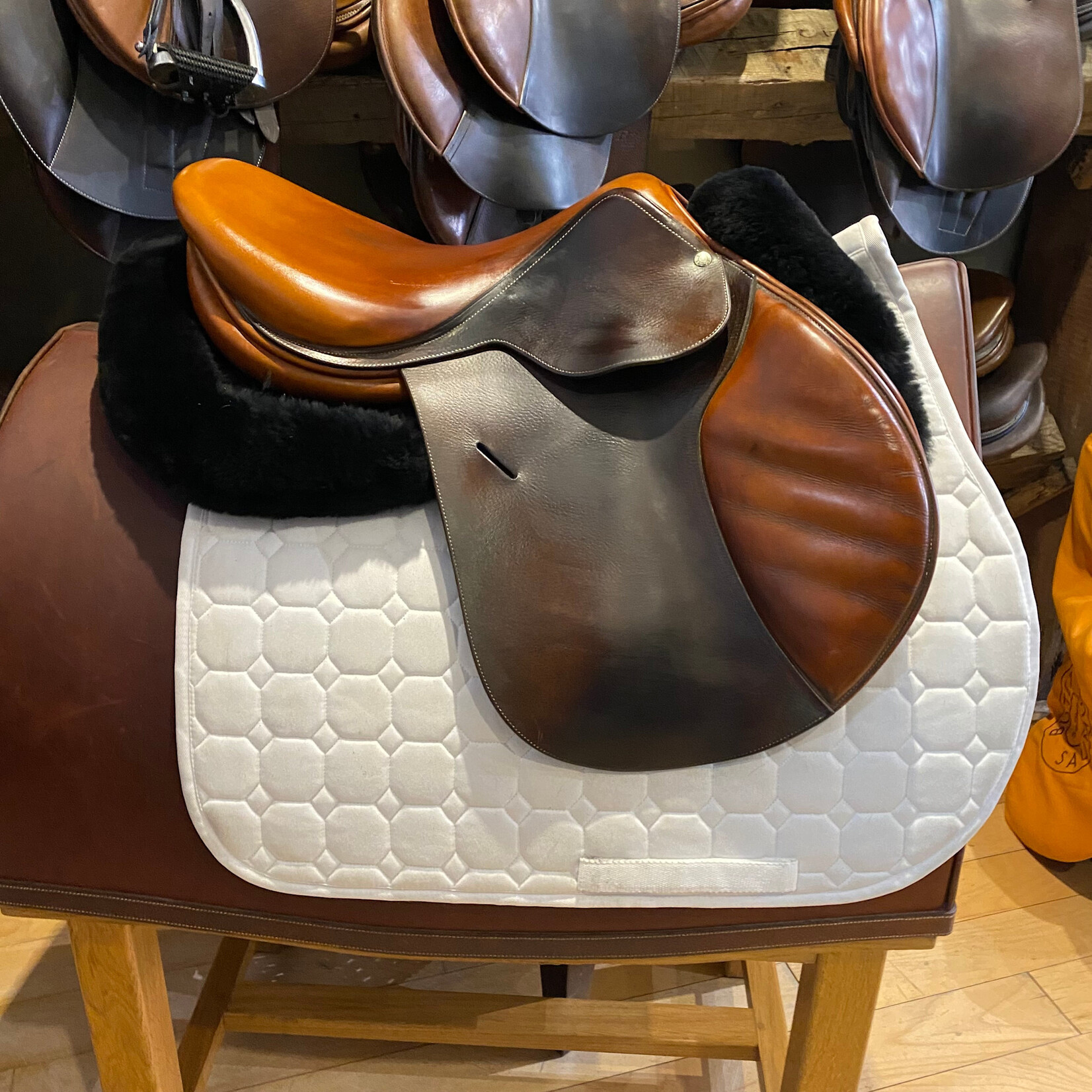 Butet #281 10 Consigned Butet Jumping Saddle Grained, 17” L (Semi-Flat) seat, 2.25 flap, STD Tree, Gold, Butet. cover included
