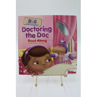 Paperback Disney Junior: Doctoring the Doc (Doc McStuffins)