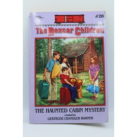 Paperback Warner, Gertrude Chandler: The Haunted Cabin Mystery (The Boxcar Children #20)
