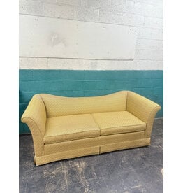 Curved Back Yellow Upholstered Sofa